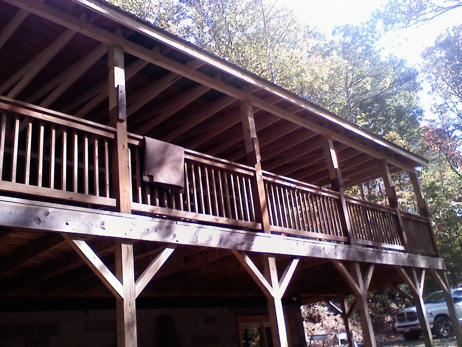 Timber framing under a new elevated porch and deck — Roof Leak Repair in Evart by Roofing Brothers